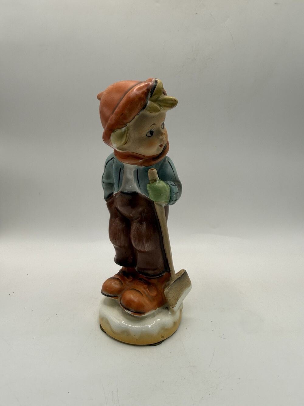 Vintage Boy With Shovel Bird on Post Ceramic Figurine 6.5” *